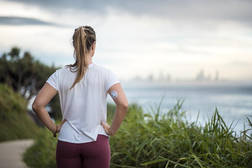 Woman outside looking at the water