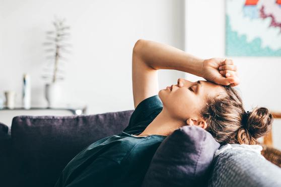 Woman laying on couch